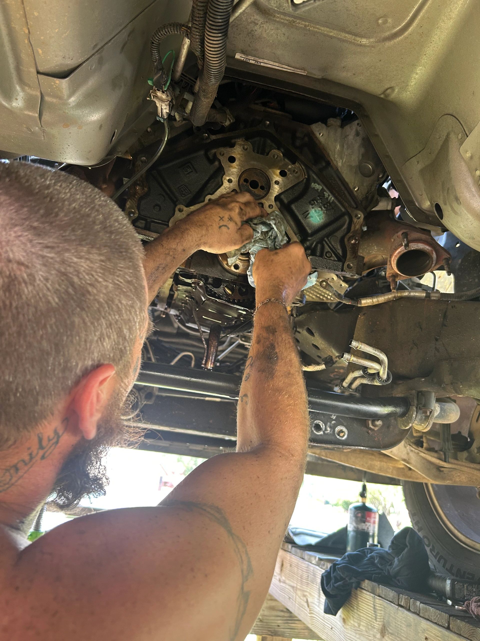 Mechanic working under vehicle